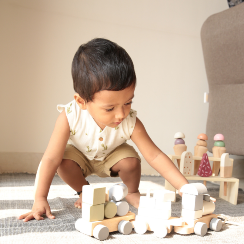 This beautiful wooden train offers a lot of hours of stacking fun. The toy helps develop and boost key skills like fine motor skills, hand-eye coordination, and encourages creativity in the assembling process. EU certified (EN-71), natural, non-toxic and eco-friendly Organic cotton organic muslin premium gift luxury gift sustainable clothes baby clothes baby gift newborn gift birthday gift onesie bodysuit